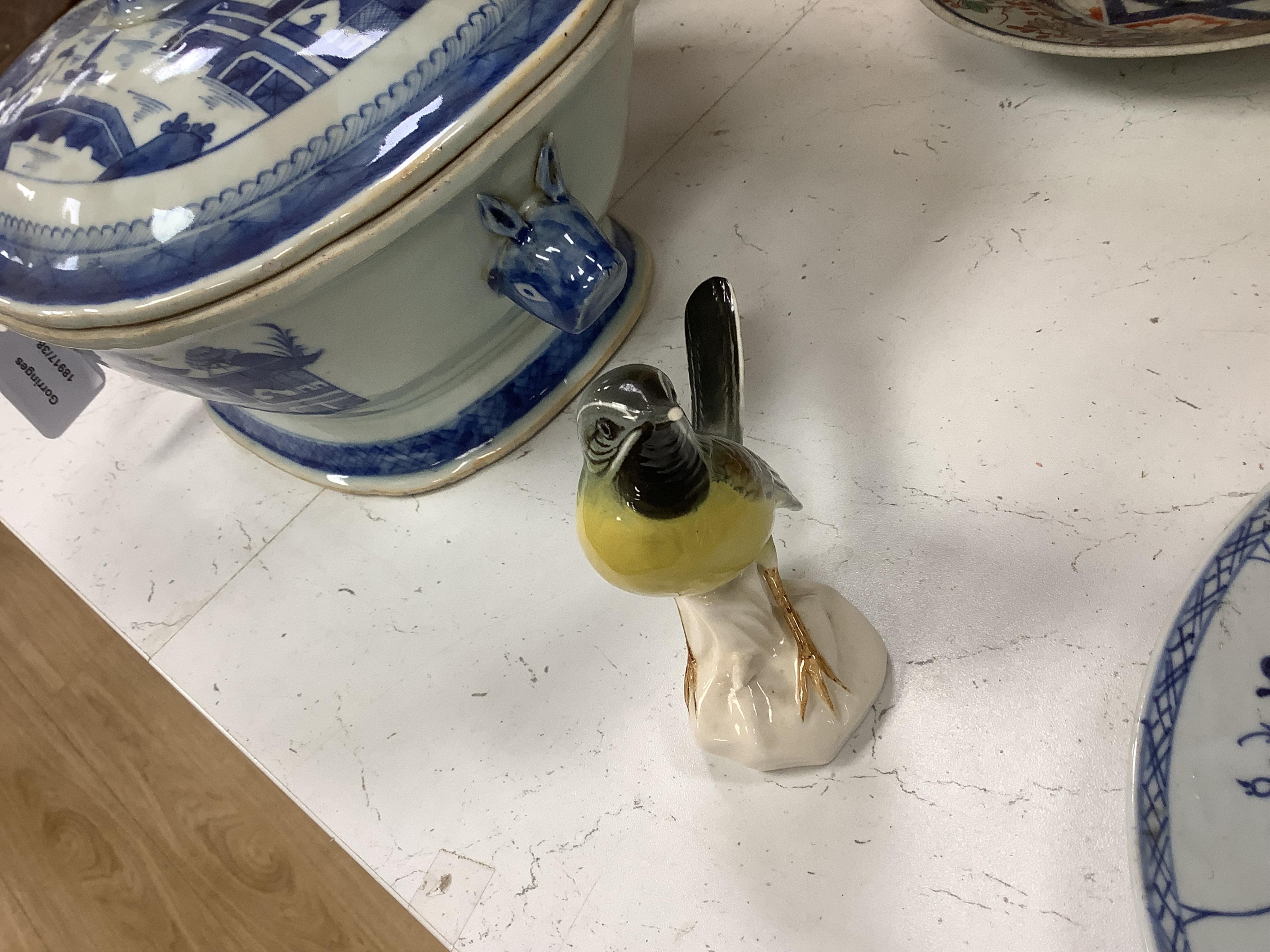 A collection of Copenhagen and other German porcelain birds, tallest 20cm